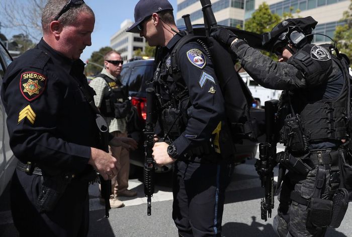 Police bruno officers calif headquarters workers opened tuesday outside keep fire san woman after threat questioned shooting seem attacker didn Cops nab crooks using youtube